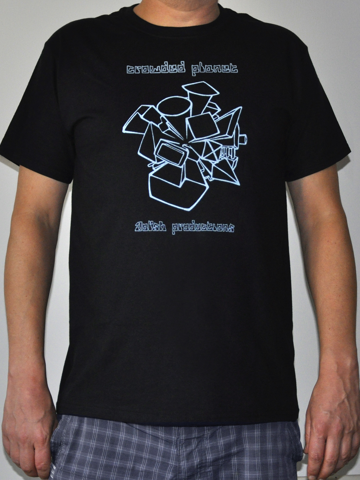 t-shirt depicting tall urban buildings obscuring the globe completely.
